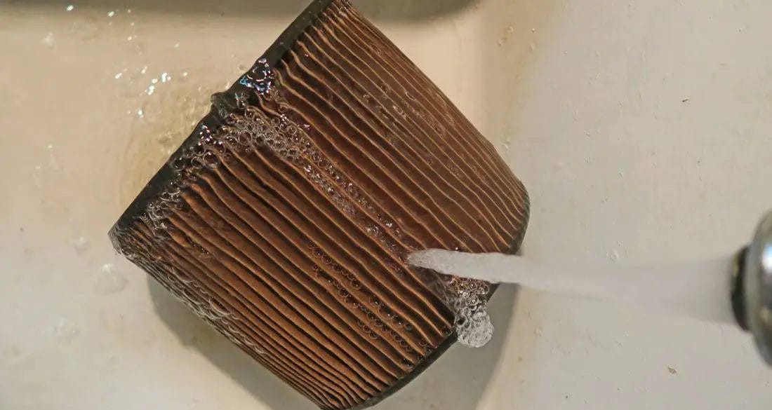 Cleaning with water and detergent